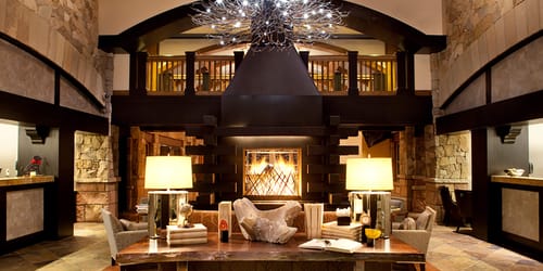 Fireplace warms up the main reception area at The Sebastian - Vail