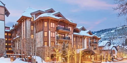 exterior shot of The Sebastian - Vail hotel portico in winter