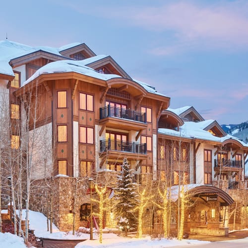 exterior shot of The Sebastian - Vail hotel portico in winter